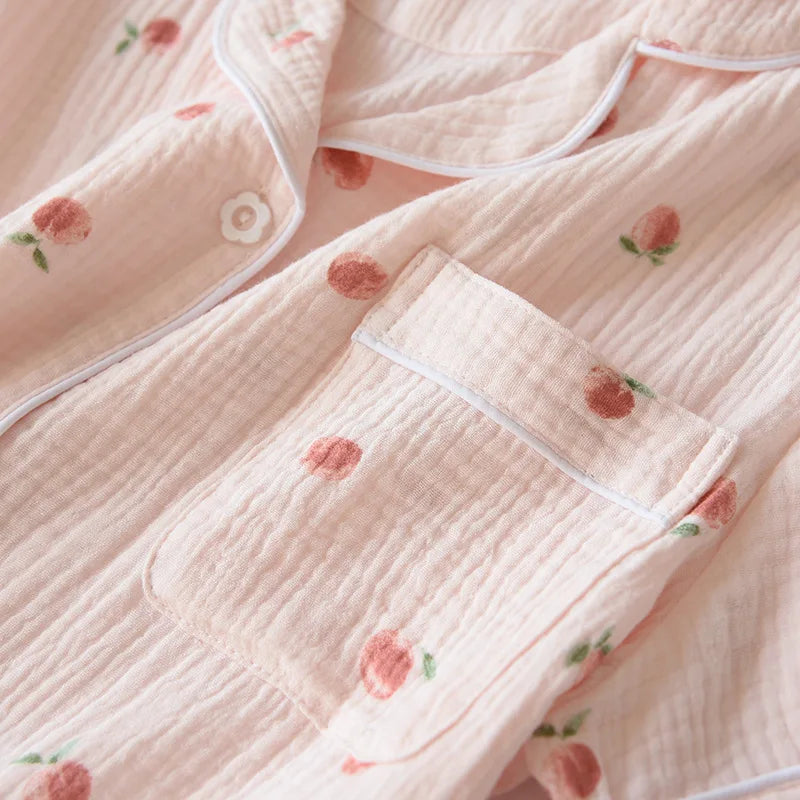 Pink quilted fabric with kawaii floral embroidery on a soft background