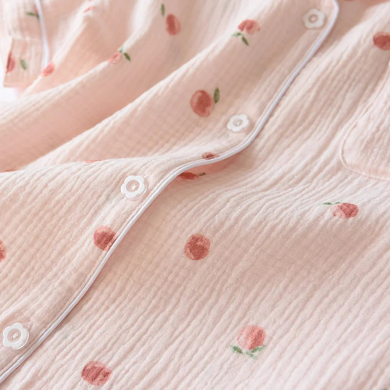 Close-up of a soft pink fabric with small kawaii floral patterns
