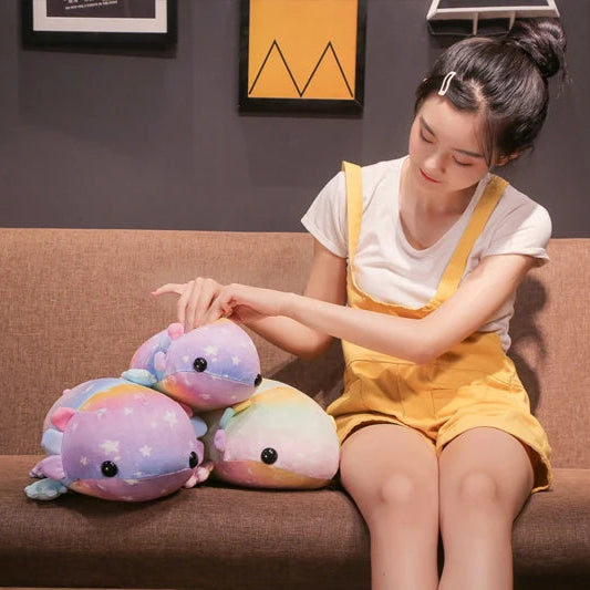 Woman sitting on a couch with colorful kawaii plush toys