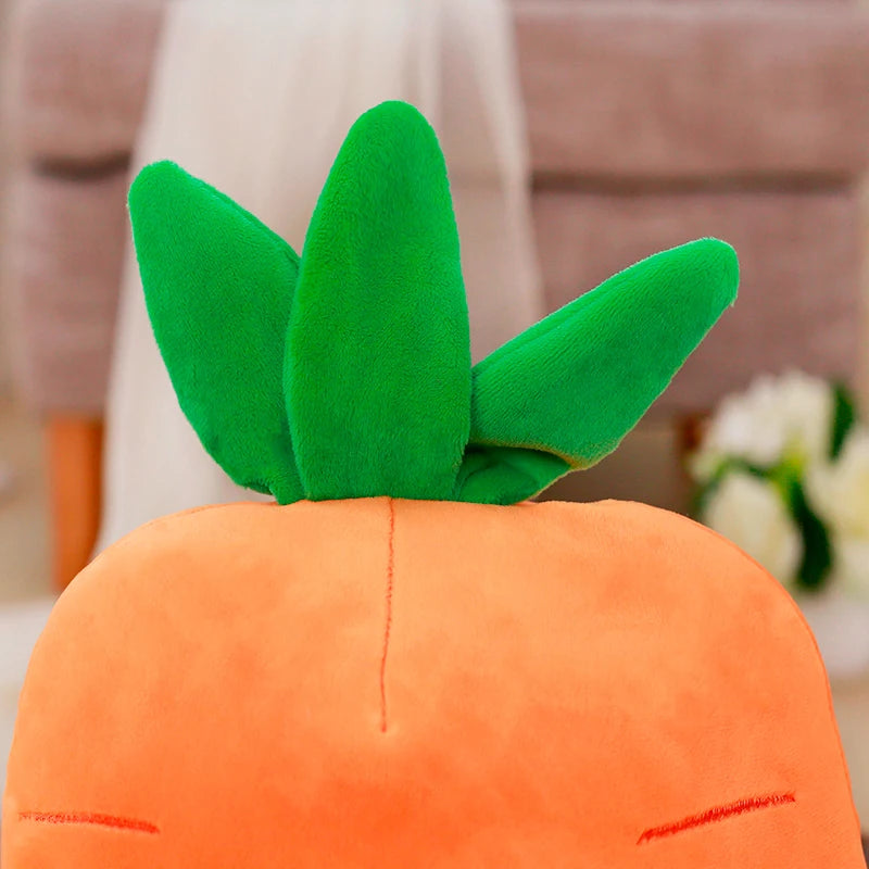 Kawaii plush carrot toy with green leaves on a blurred background