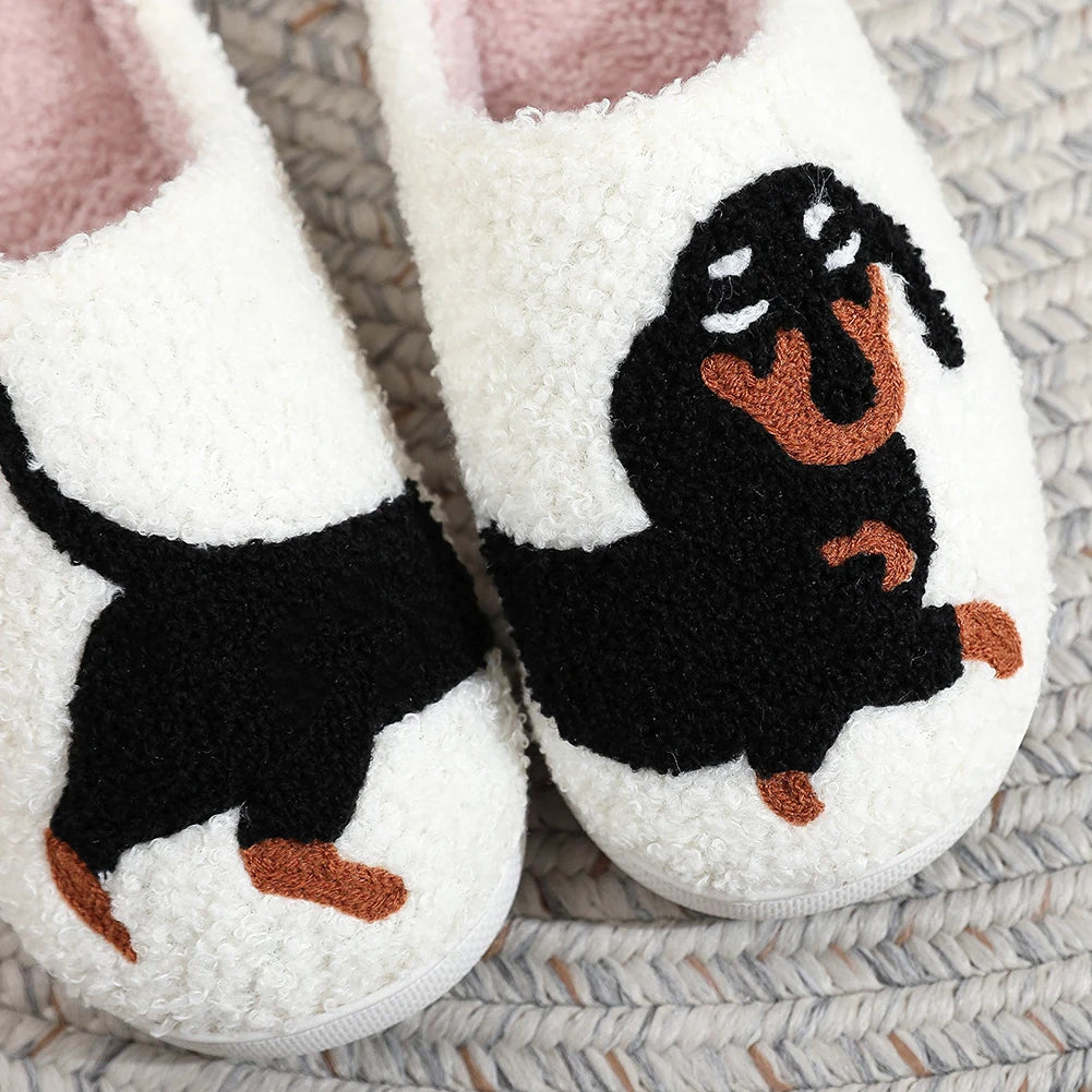 White kawaii slippers with black dog design on a textured surface