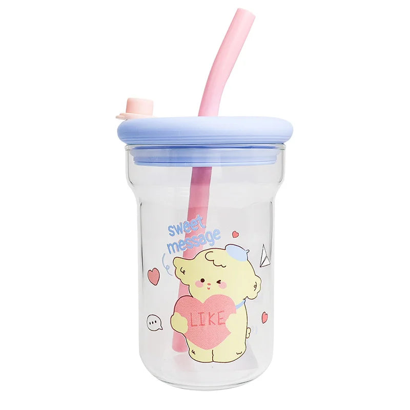 Clear tumbler with a Kawaii cartoon bear holding a heart and text, pink straw, and blue lid on a white background.