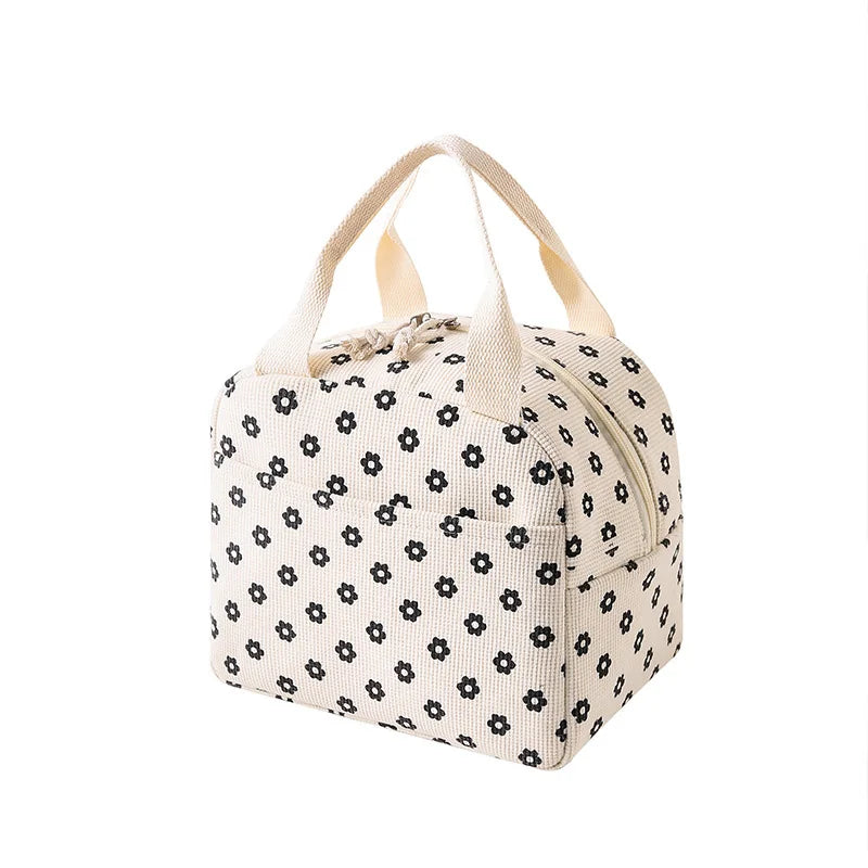 White bag with black kawaii floral pattern on a white background