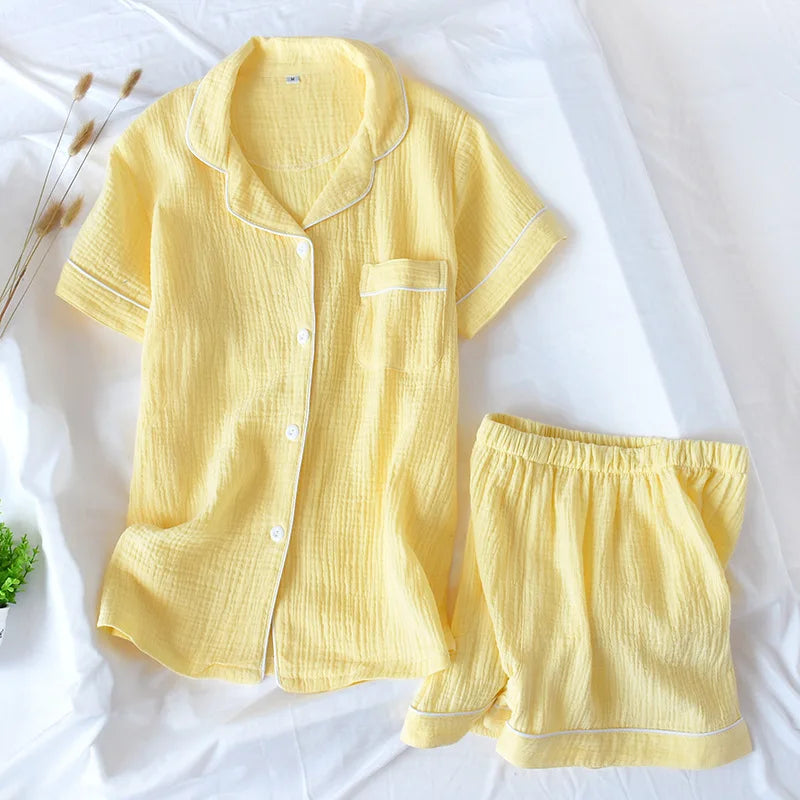 Yellow pajama kawaii set with shirt and shorts on a white background