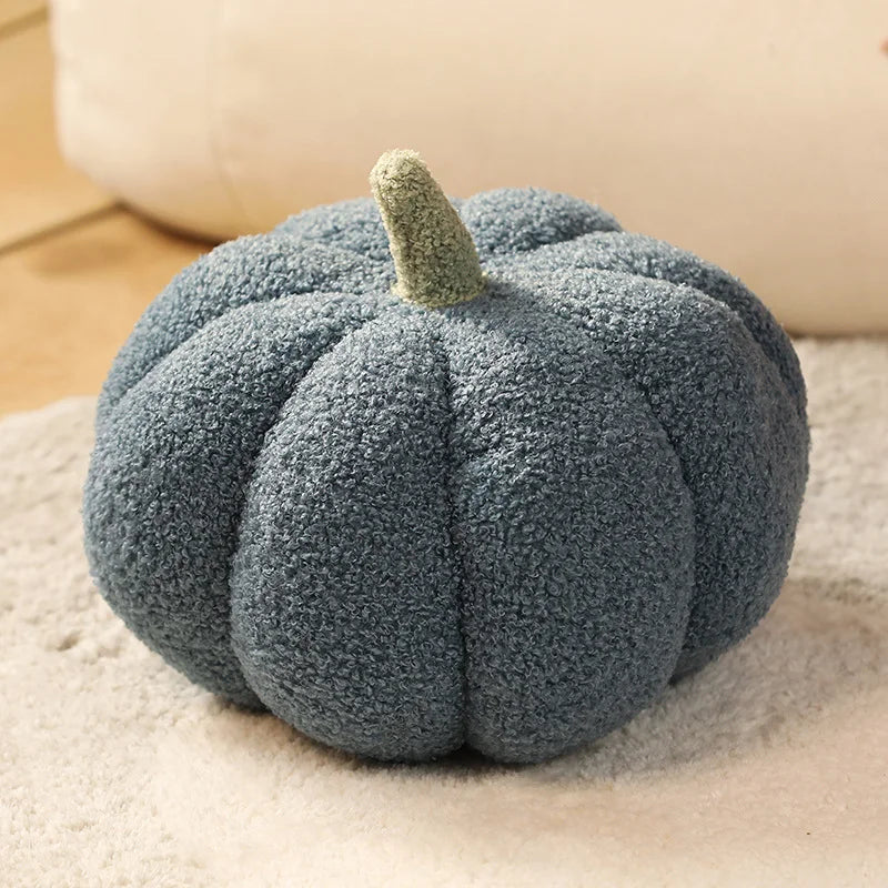 Blue textured kawaii pumpkin on a beige surface