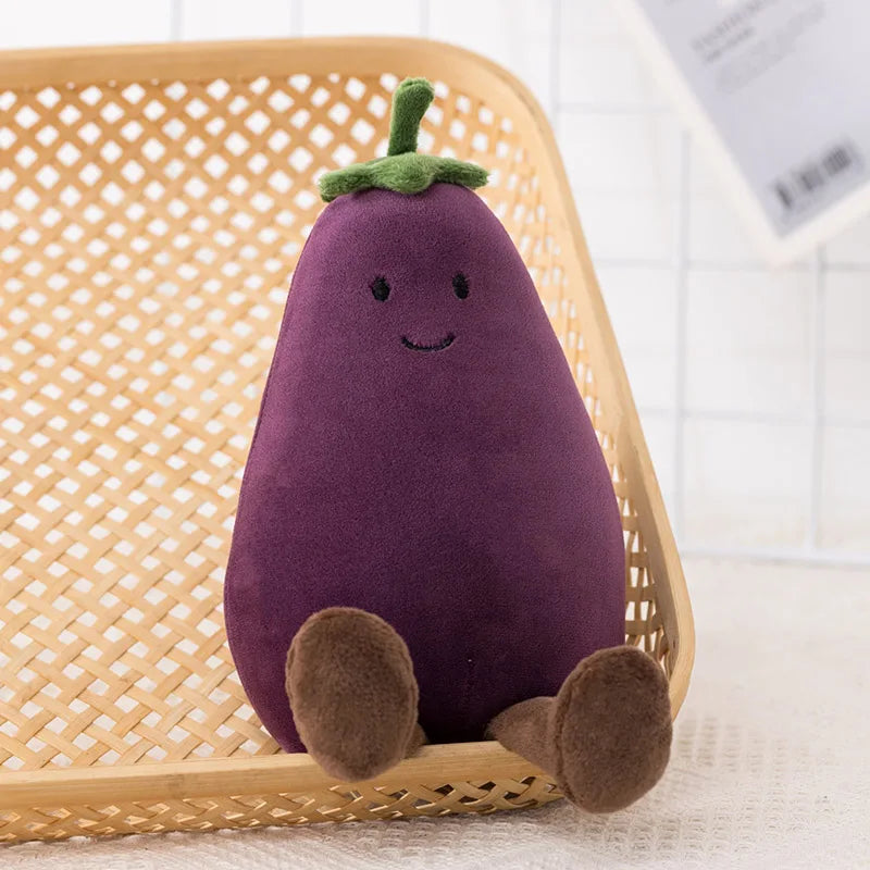 Plush kawaii toy shaped like an eggplant sitting on a woven chair.