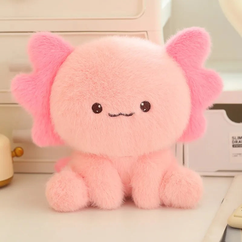 Pink kawaii plush toy with a cute face on a light background