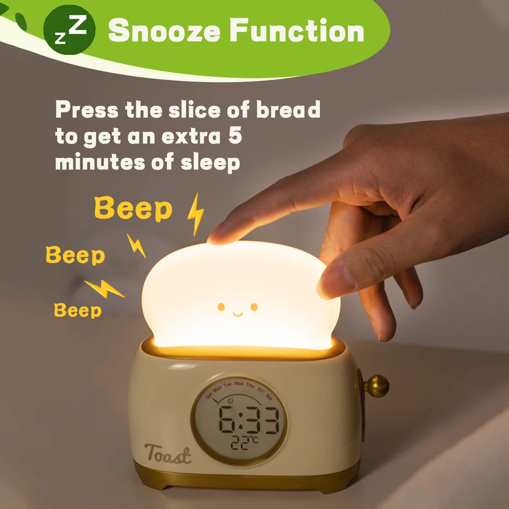 Toy Kawaii toaster with digital clock and bread slice indicator, featuring a hand pressing the bread slice to extend sleep time.