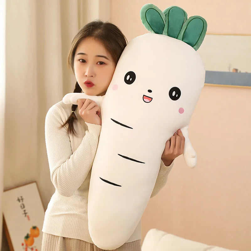 Person holding a large, cute carrot-shaped kawaii plush toy