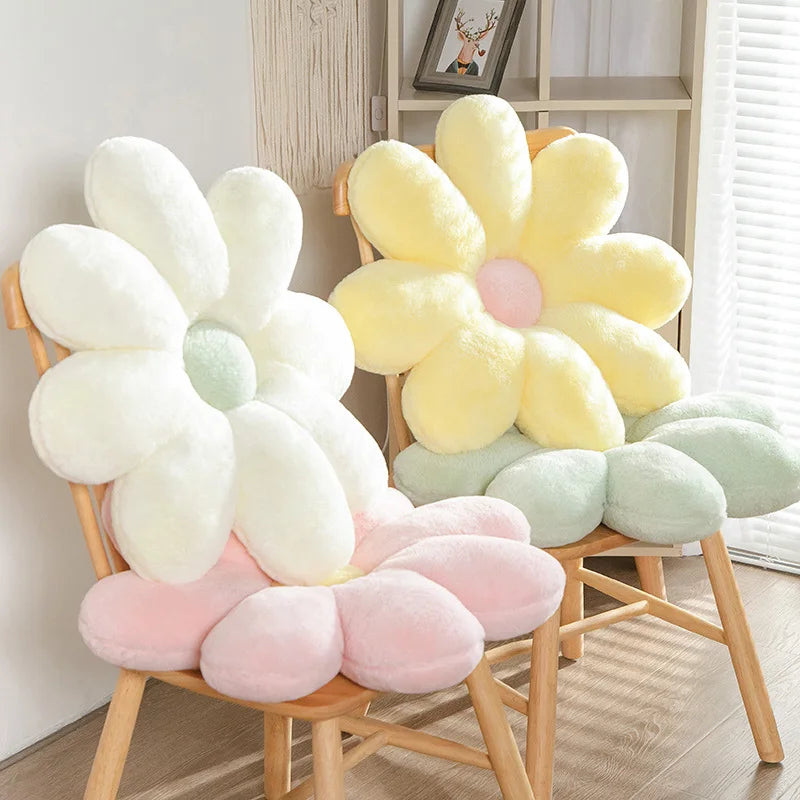 Flower-shaped Kawaii cushions on a chair in a room with a window and decor.