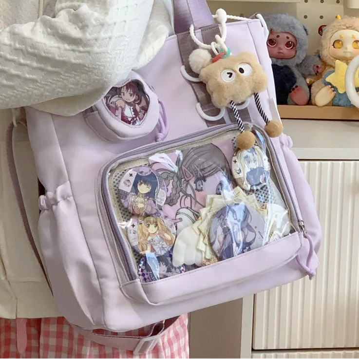 Person holding a purple bag with Kawaii plush toys and stationery items, with a shelf of figurines in the background.