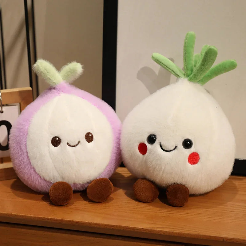 Two cute kawaii plush toys resembling turnips on a wooden surface.