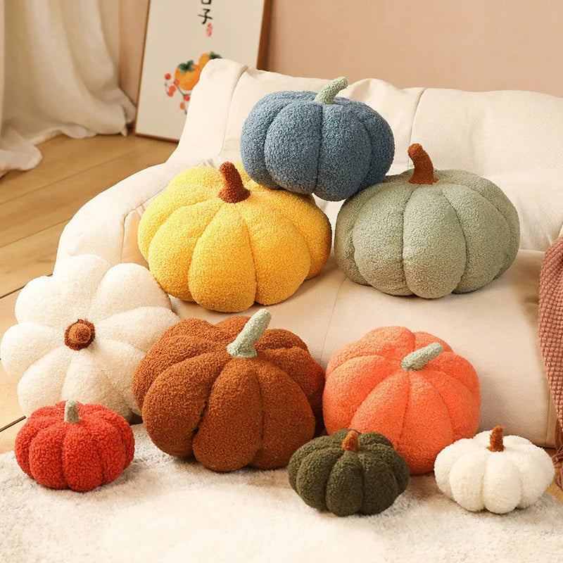 Colorful kawaii pumpkin-shaped cushions on a sofa