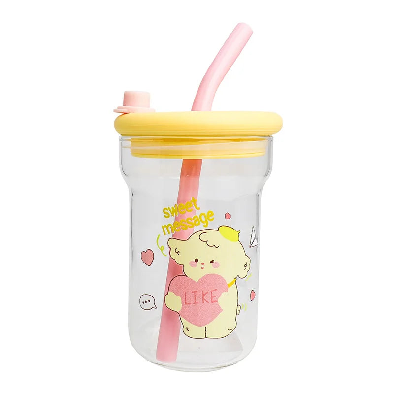 Clear tumbler with yellow lid and pink straw featuring a Kawaii cartoon character and text on a white background.