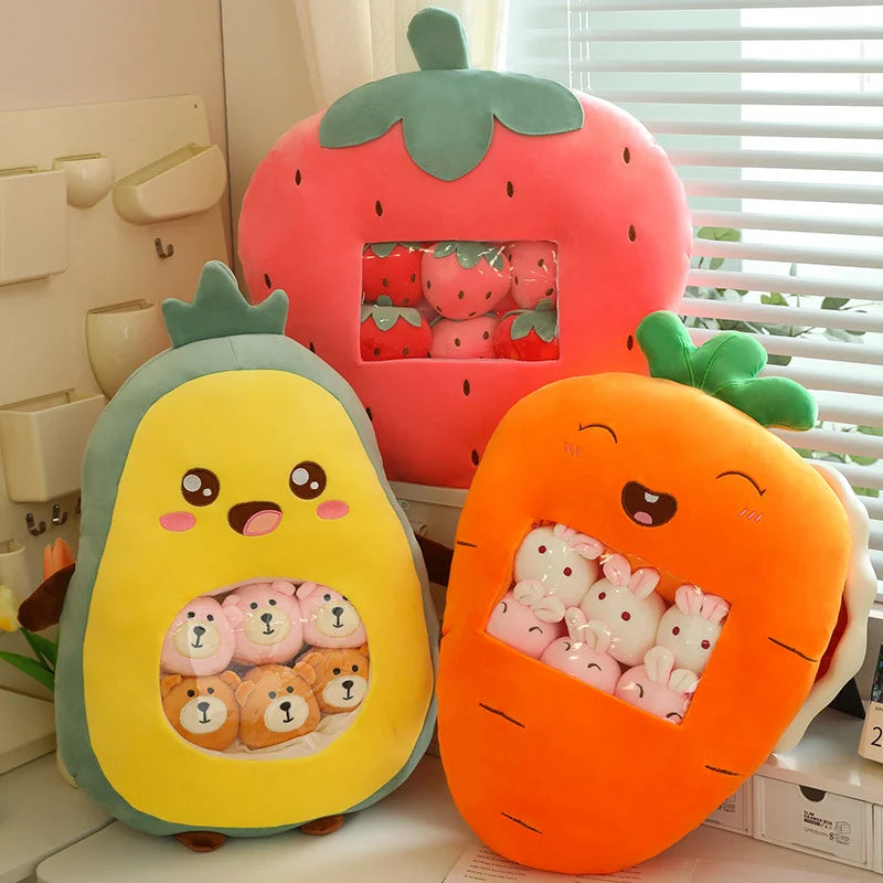 Three kawaii plush toys shaped like a strawberry, avocado, and carrot with cute faces.
