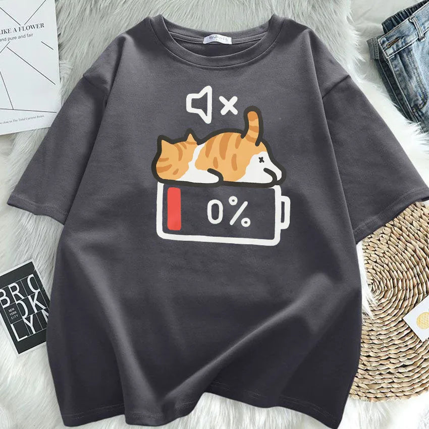 Gray t-shirt with a kawaii cat graphic on a light gray surface