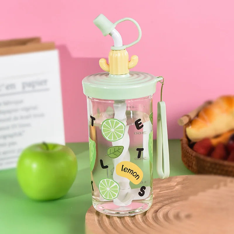 Clear water bottle with colorful Kawaii design on a pink background