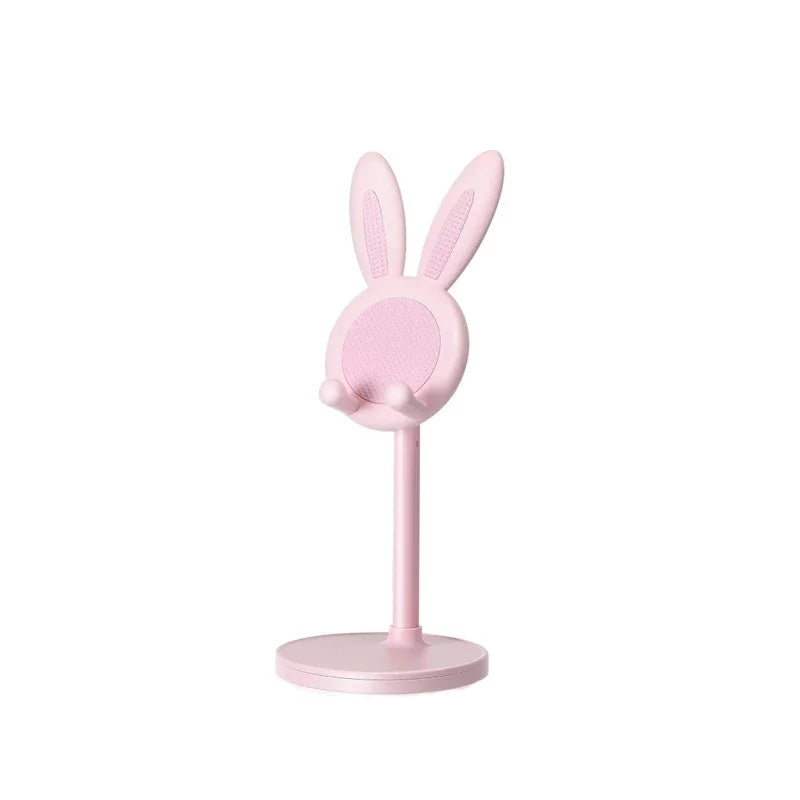 Pink bunny-shaped kawaii phone stand on a white background