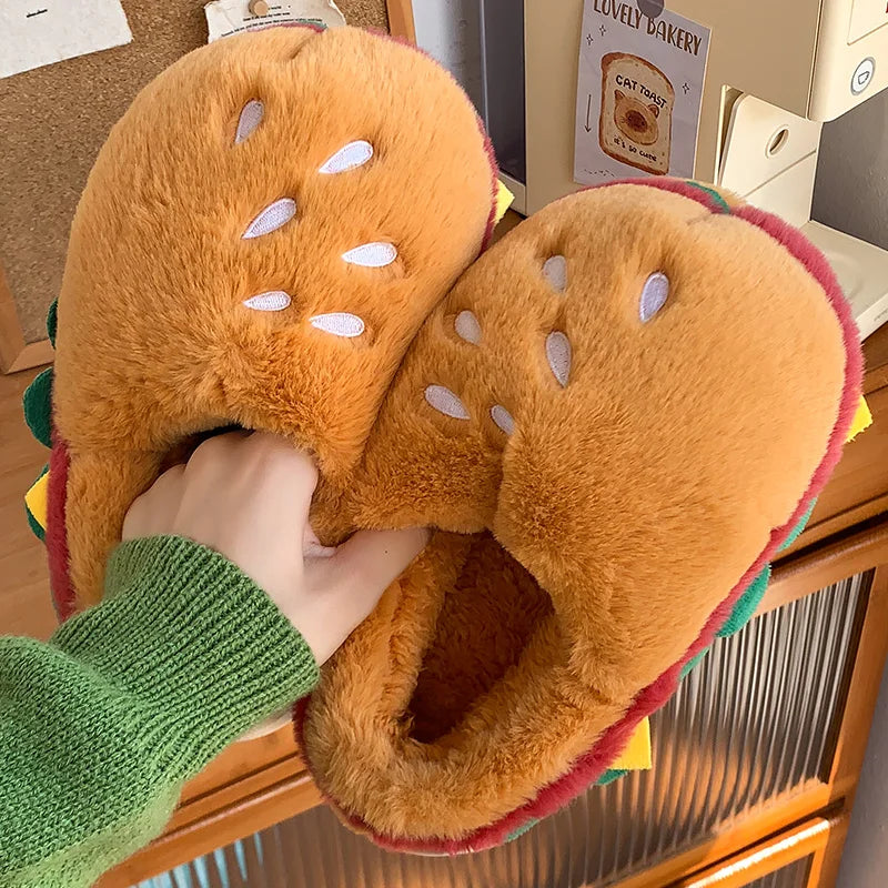 Plush dinosaur kawaii slippers held by a person wearing a green sweater.