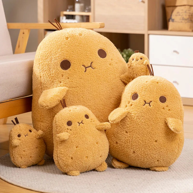 Set of plush kawaii toys resembling bunnies on a carpeted floor.
