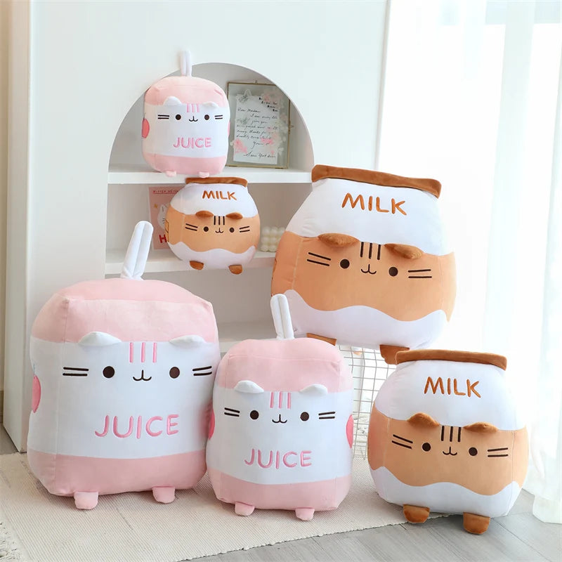 Set of cute kawaii plush toys resembling milk and juice containers with cartoon faces on a white background.