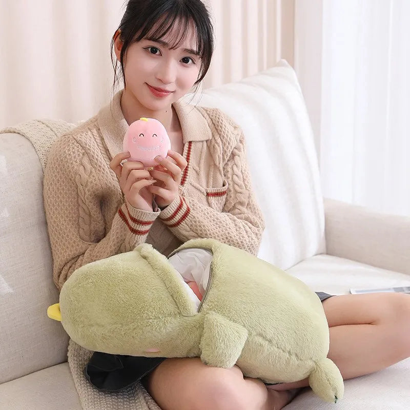 Person holding a kawaii plush toy on a couch