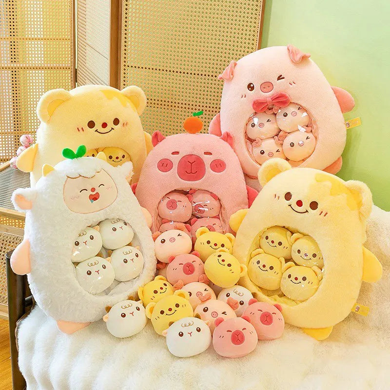 Collection of cute kawaii plush toys shaped like animals on a white surface with a light background.