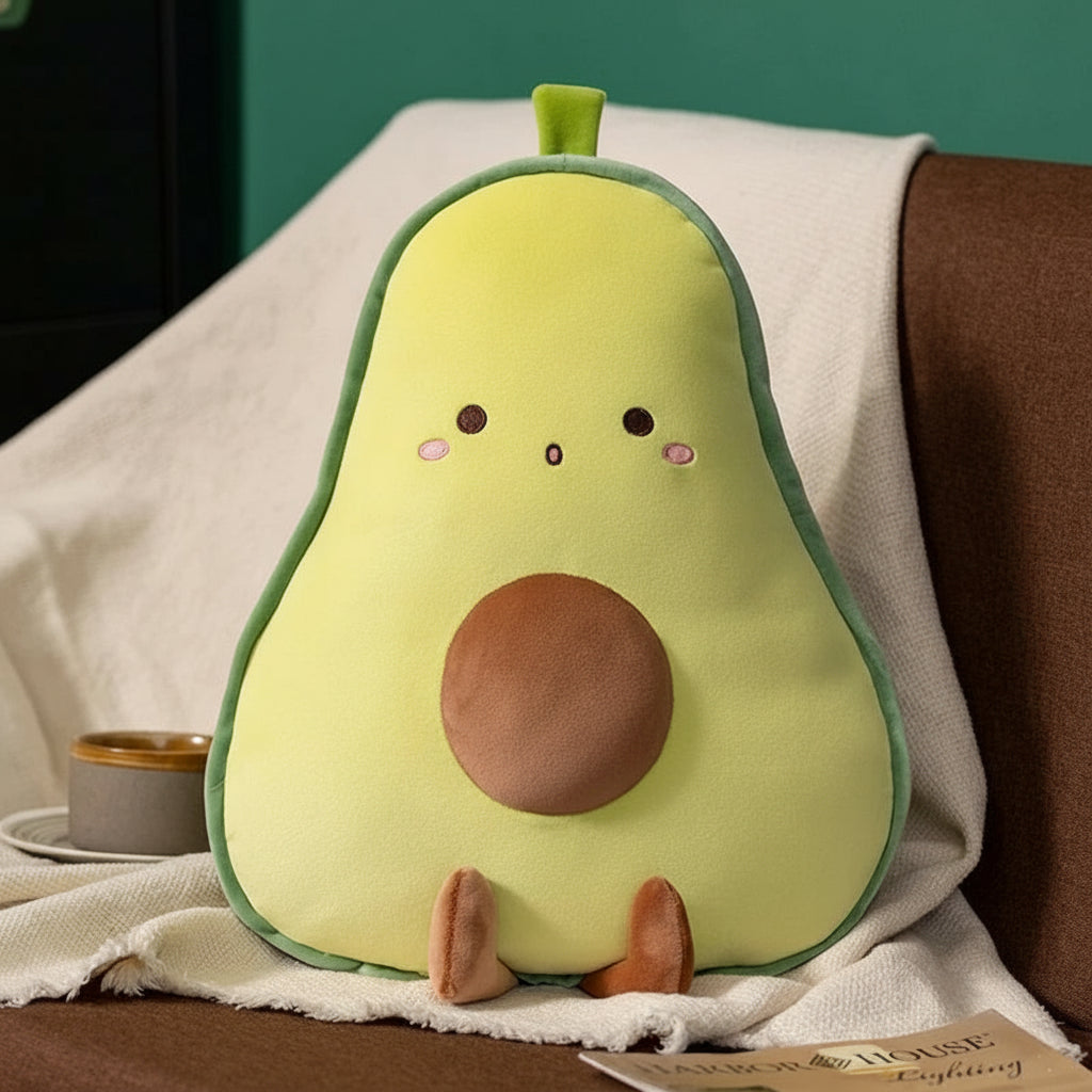 Avocado-shaped kawaii plush toy on a blanket with text in a green box