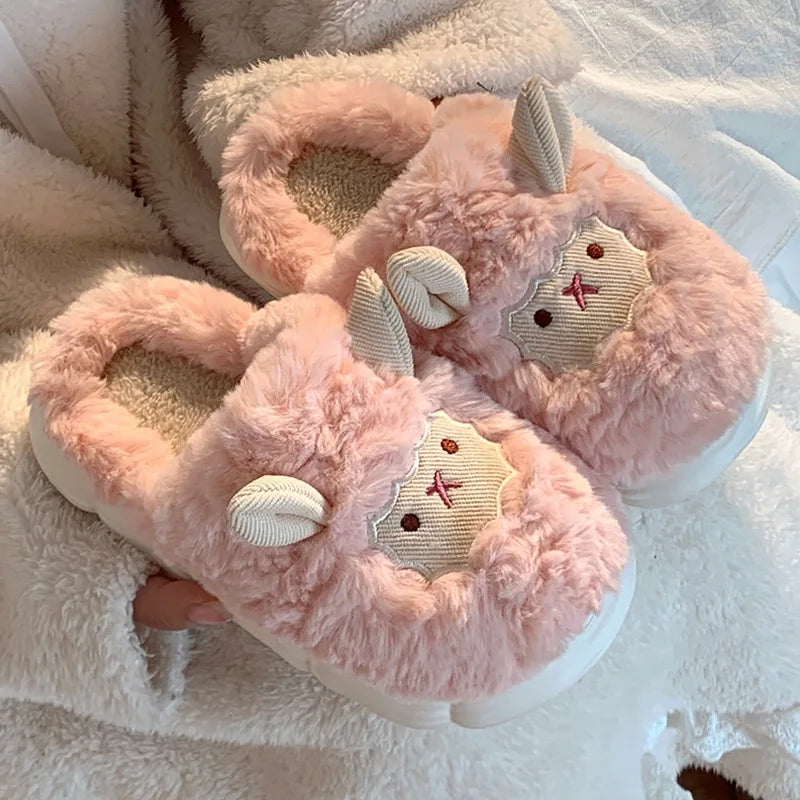 Pink kawaii bunny slippers with fluffy texture on a soft white background