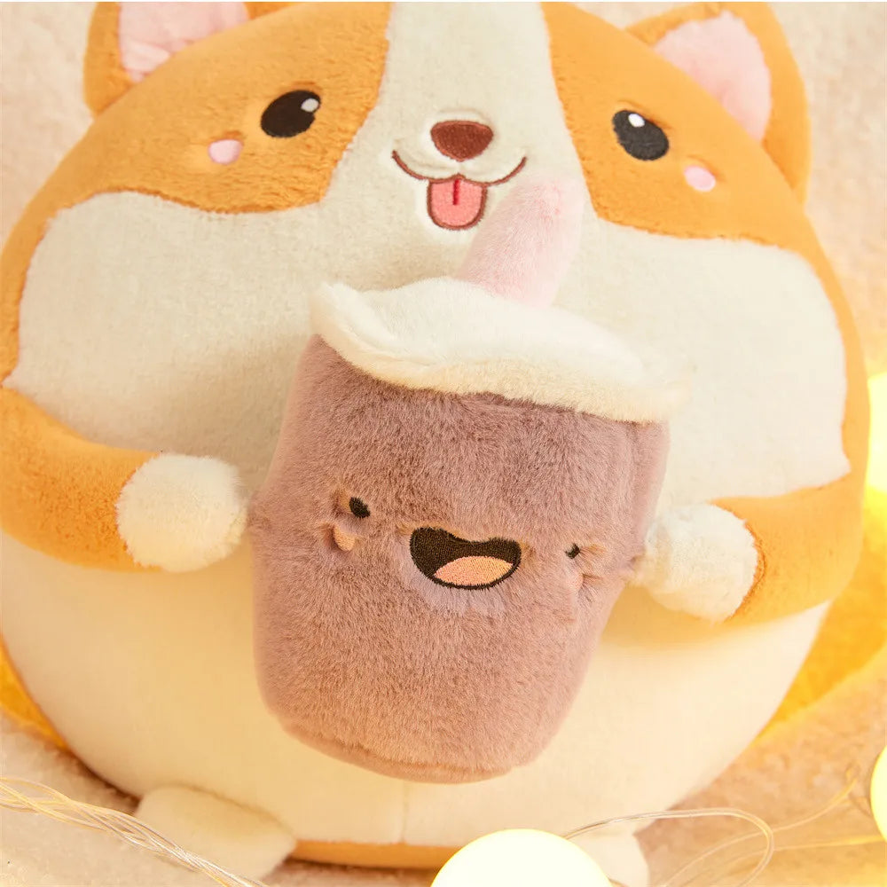 Plush toy shaped like a corgi with a smaller plush kawaii toy inside, on a light background.