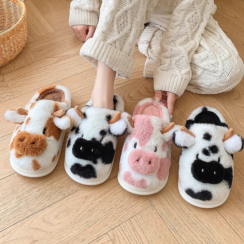 Four kawaii animal-themed slippers on a wooden floor with a person wearing them.