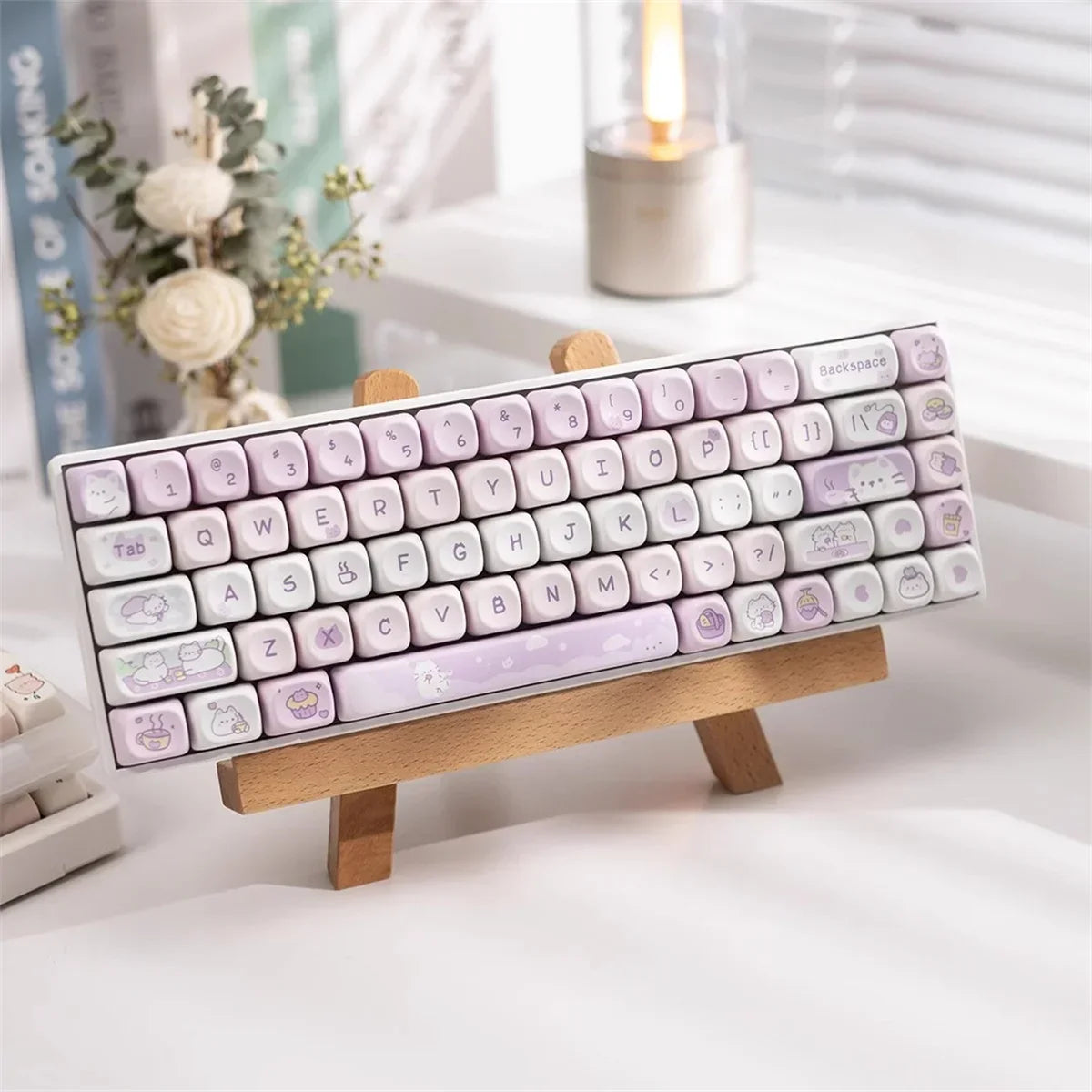 Keyboard with Kawaii pastel keys on a wooden stand in a soft-focus background