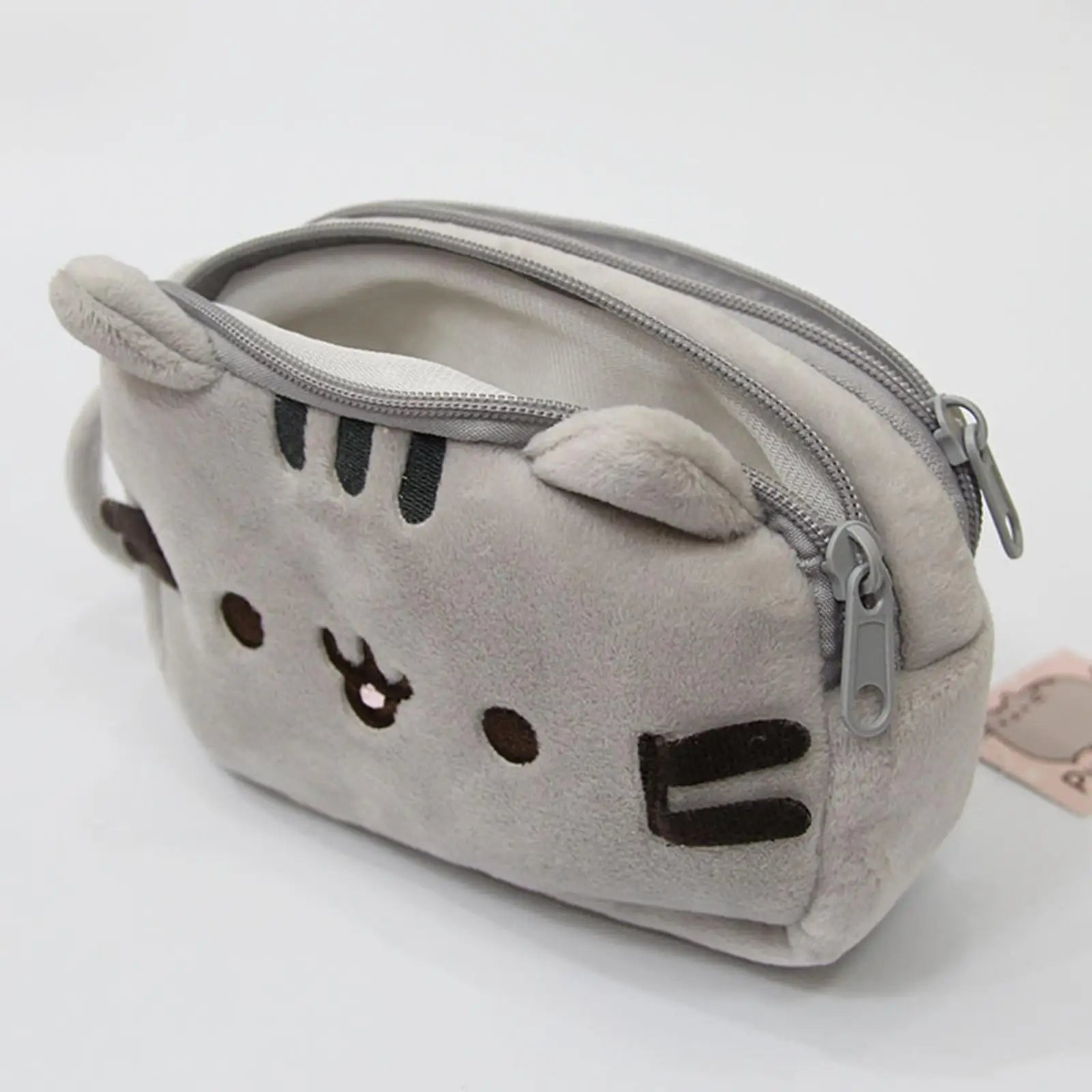 Plush pouch shaped like a kawaii cat with a zipper on a white background