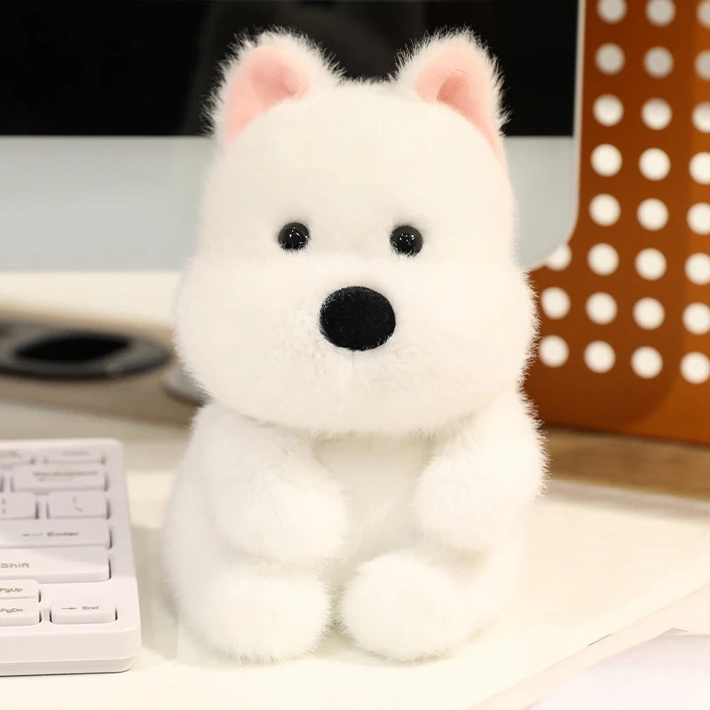 White plush dog kawaii toy on a desk with a keyboard and polka dot object in the background