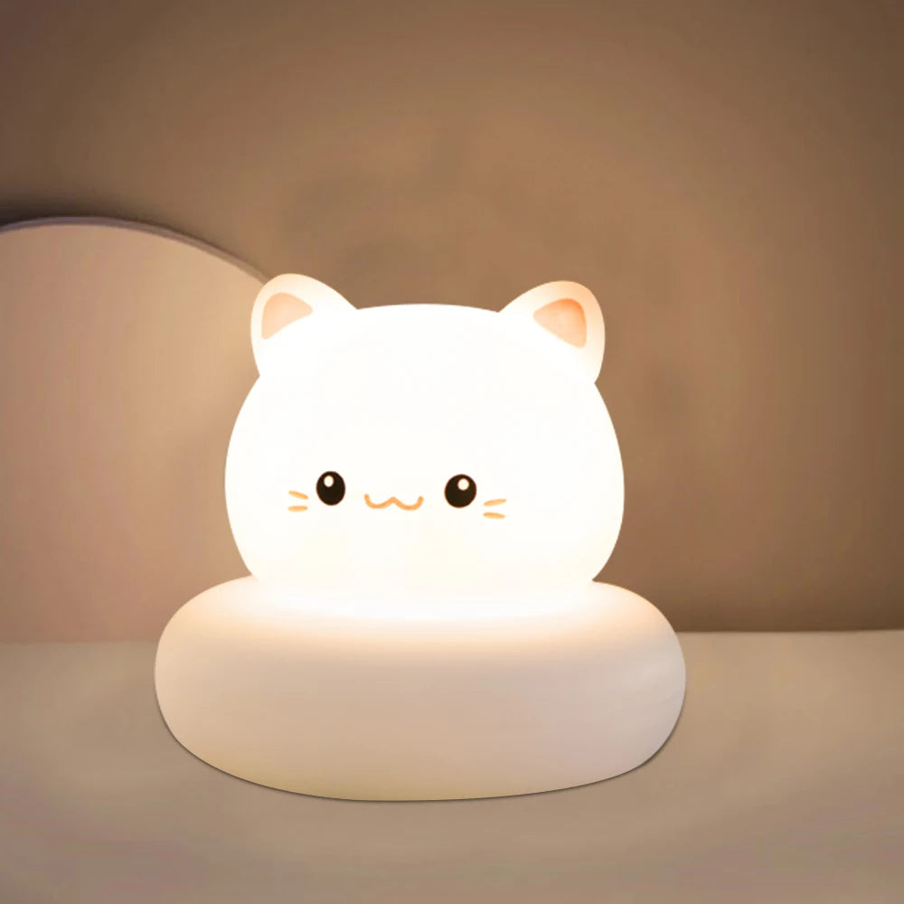 Cute kawaii cat-shaped night light on a neutral background