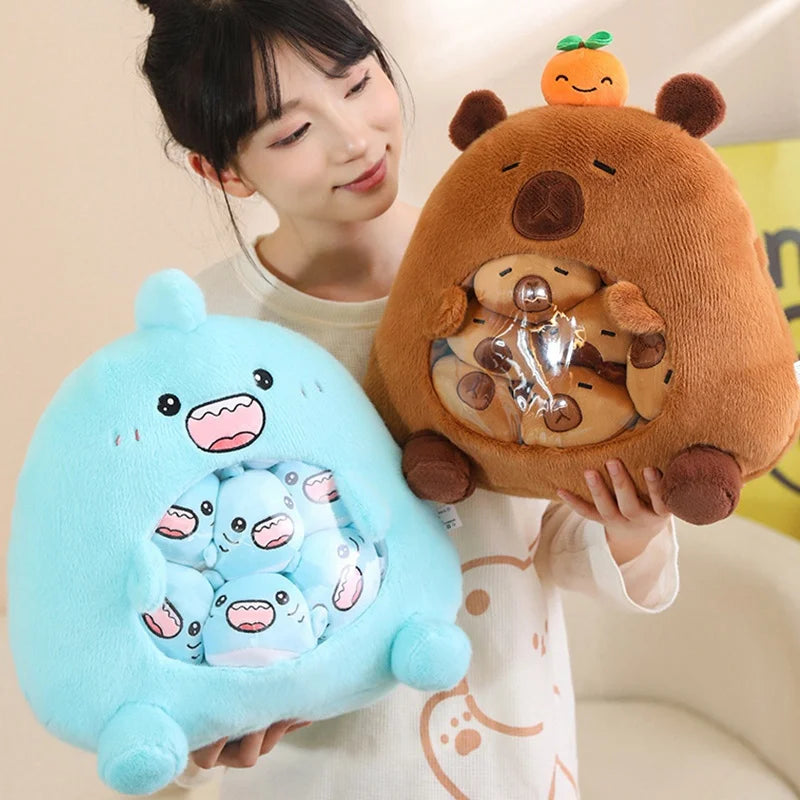 Person holding two kawaii plush toys, one blue and one brown, against a neutral background.