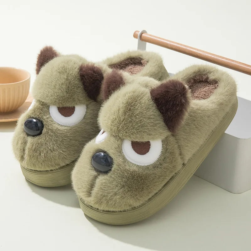Pair of kawaii cartoonish dog slippers on a light background
