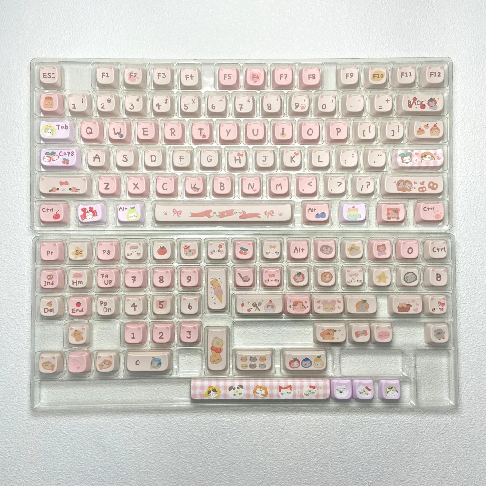 Kawaii keyboard with pink and white keycaps on a light gray background