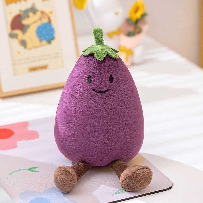 Kawaii plush toy shaped like an eggplant with a smiling face on a white surface.