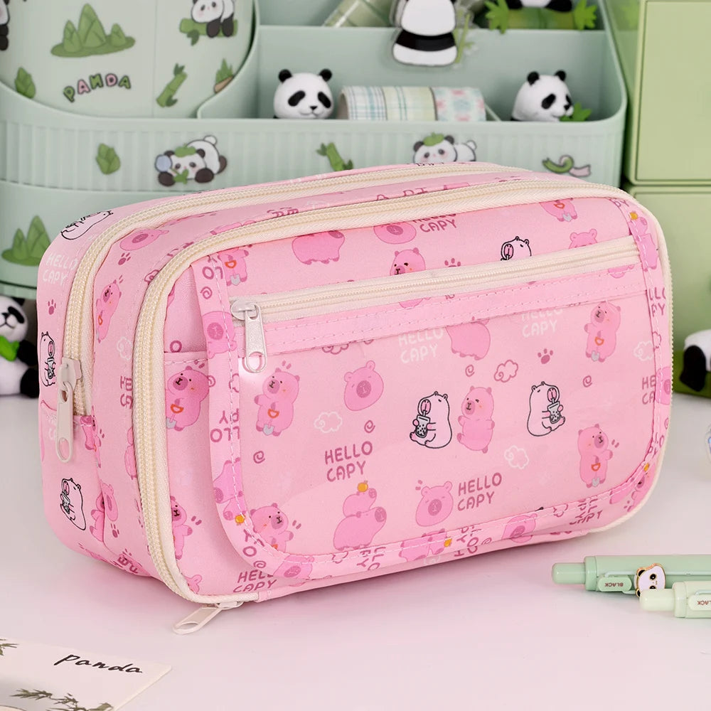 Pink kawaii pencil case with 'Hello Capy' design on a light pink background