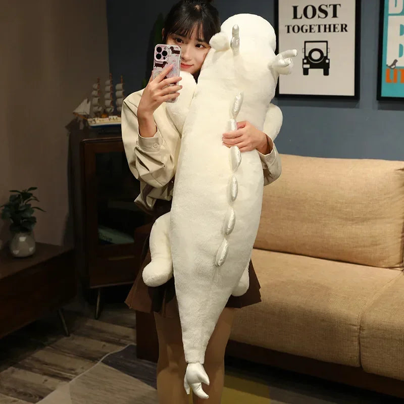 Person holding a large white kawaii plush toy in a living room.