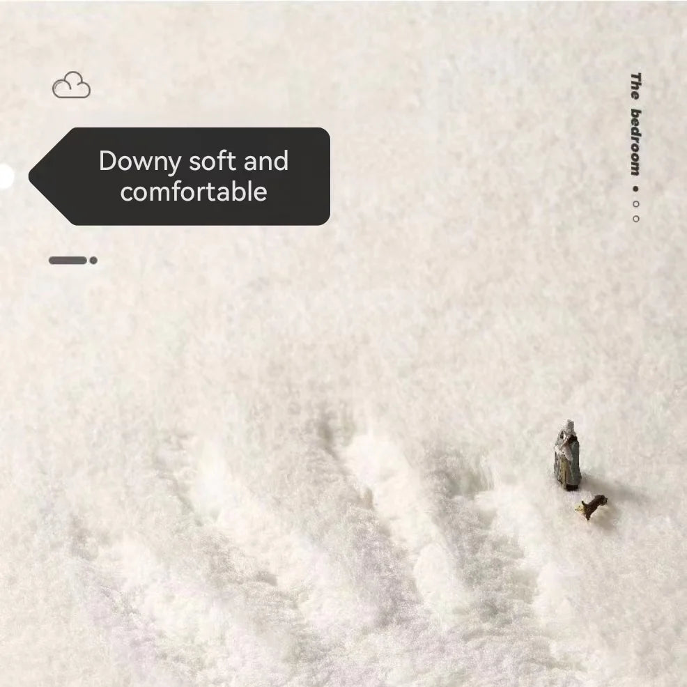 Close-up of kawaii fluffy white bedding with a person lying on it, labeled 'Downy soft and comfortable'.