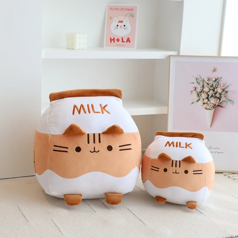 Two kawaii plush toys shaped like milk jars with cat faces on a light wooden floor.