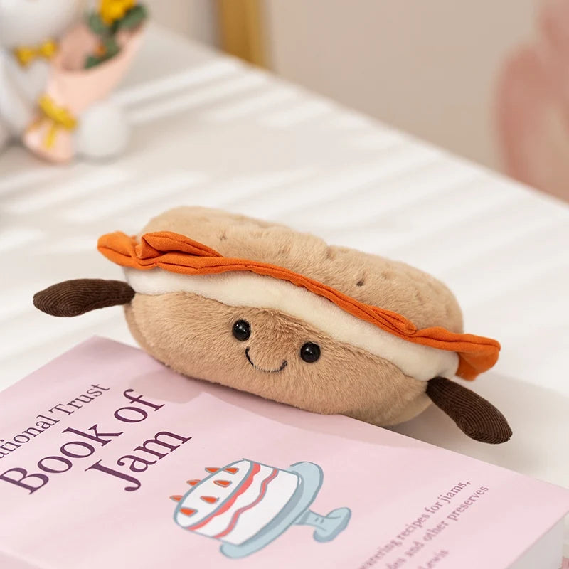 Plush kawaii toy resembling a sandwich with a smiling face on top of a book