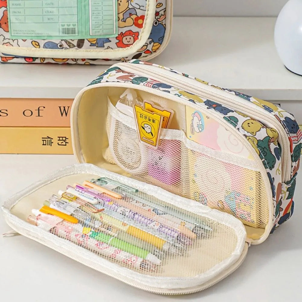 Pencil case with kawaii colorful design and stationery items on a white surface