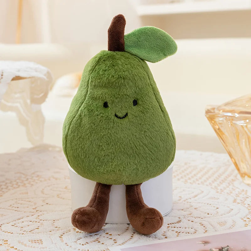 Plush kawaii toy shaped like a green pear with a smiling face on a lace tablecloth.