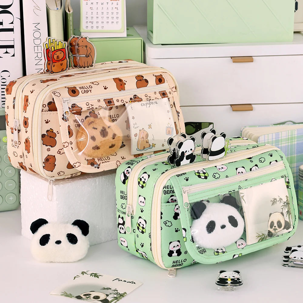 Two small bags with kawaii panda and bear patterns on a white surface.