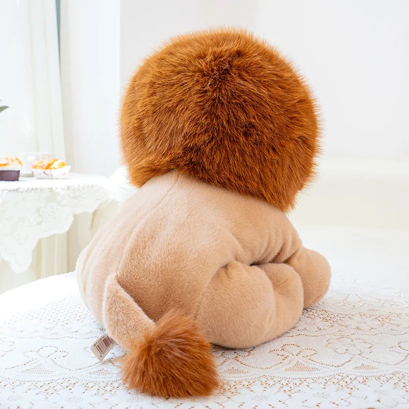 Kawaii plush toy lion with brown mane and tail on a white lace surface