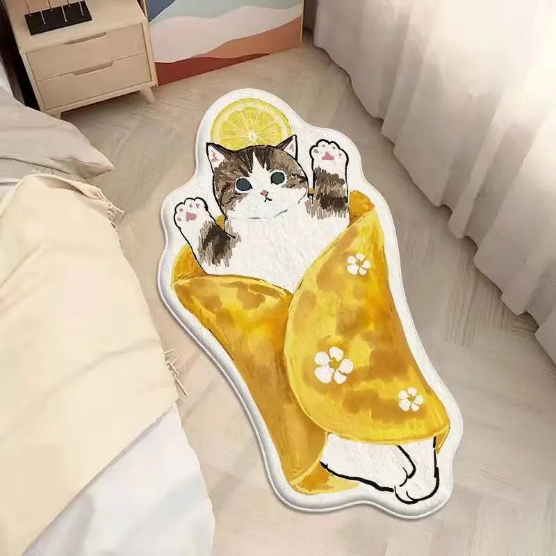 Kawaii cat-shaped mat with a lemon design on a bed