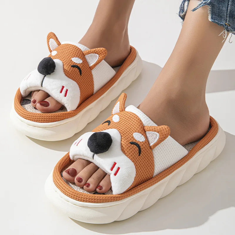 Dog-shaped kawaii slippers worn by a person on a light background